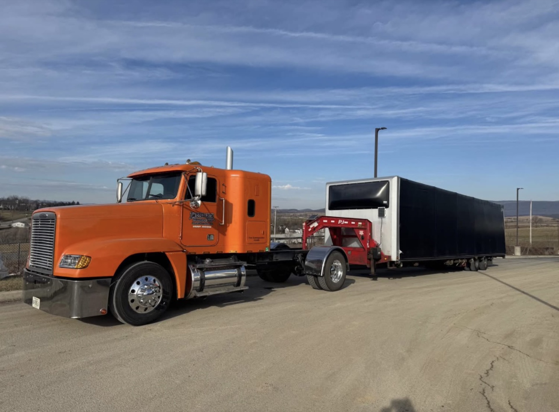 Orange Freightliner at sunset