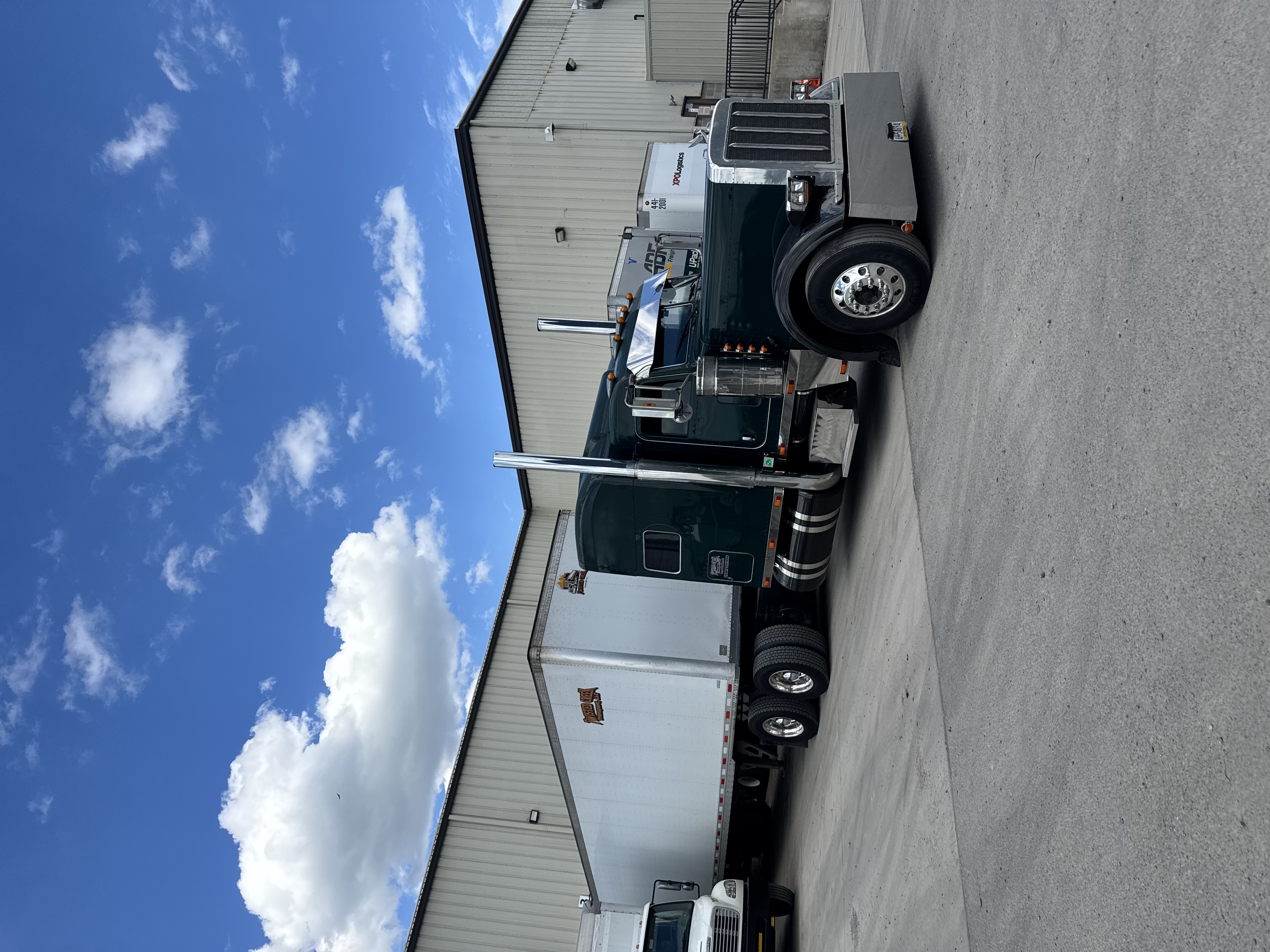 Twisted Creek dry van trailer backed into a loading dock